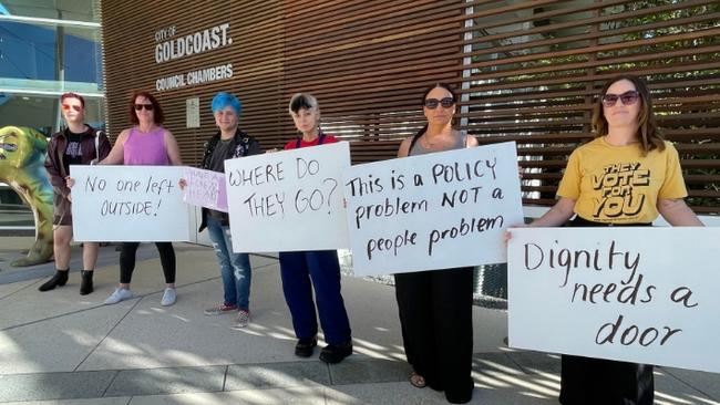Supporters of the homeless in Carey Park stage a protest outside the Gold Coast City Council chambers on council's tough compliance policy.