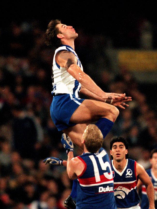 McKernan taking a mark against the Bulldogs in 1998.