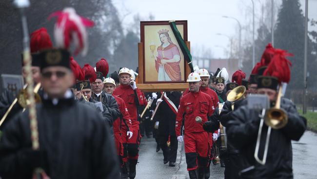 Polish coalminers celebrate their patron saint, Barbara, in Pawlowice this week. Picture: Getty Images