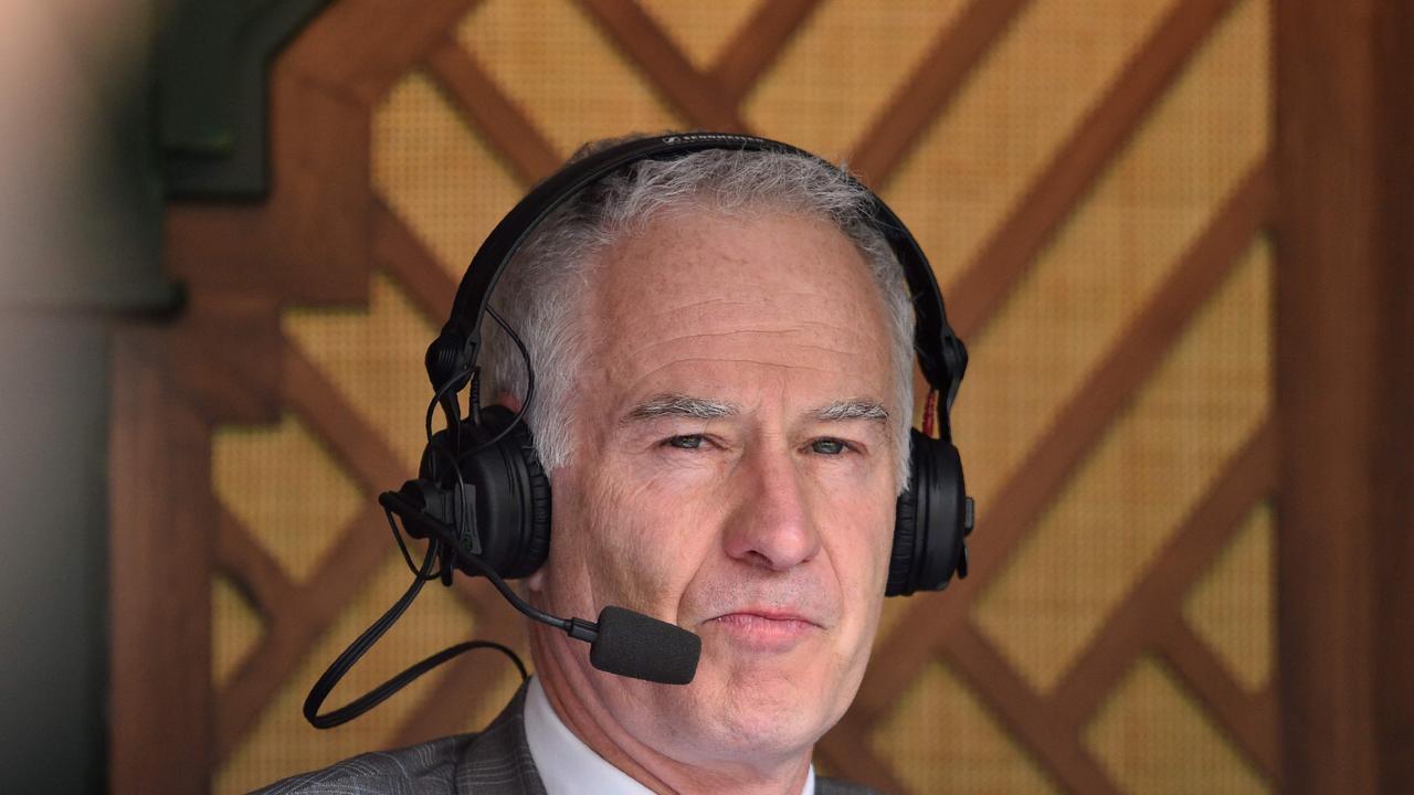 Former tennis player and broadcaster John McEnroe sits in the commentary box about centre court on the fifth day of the 2017 Wimbledon Championships at The All England Lawn Tennis Club in Wimbledon, southwest London, on July 7, 2017. / AFP PHOTO / Glyn KIRK / RESTRICTED TO EDITORIAL USE