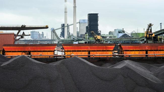 Coal stocks are seen at the Thyssenkrupp Steel Europe AG in Duisburg, western Germany on February 22, 2022. - German Minister of Economics and Climate Protection Robert Habeck visits thyssenkrupp to learn about hydrogen solutions along the entire process chain as a driver of climate change. (Photo by Ina FASSBENDER / AFP)