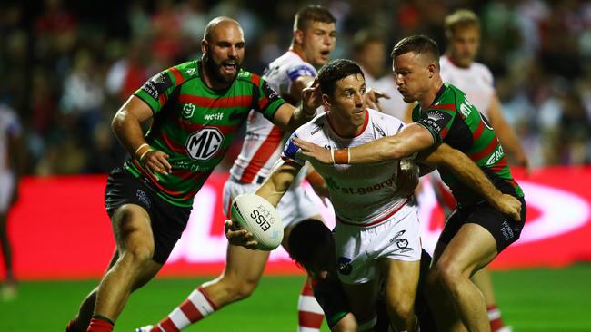 Dragons No. 7 Ben Hunt offloads during the Charity Shield win in Mudgee.