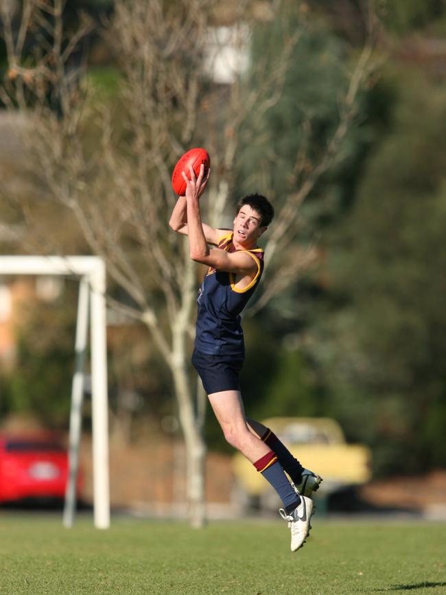 Power player Matthew Broadbent marking for St Michael’s in 2006. Picture: Stephen Laffer.