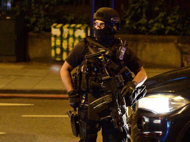 Armed police officers arrive at the scene of a terror attack on London Bridge. Picture: AFP