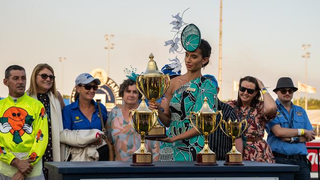 Tannwyn Lewis presents the winner trophy at the 2023 Darwin Cup. Picture: Pema Tamang Pakhrin