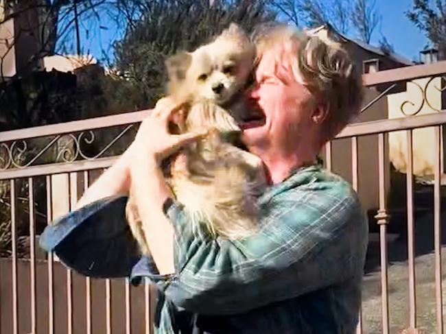 Man reunited with pet dog after five days missing in LA fires.