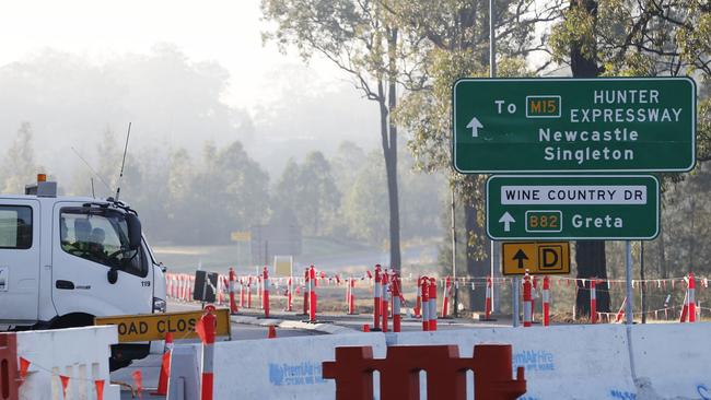 The blocked road at Wine Country Drive, Greta, which leads to the scene to the scene of a bus crash in the NSW Hunter Valley that left 10 dead. Picture: AAP Image/Darren Pateman