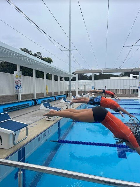 Palm Beach Currumbin High School students Kairo Brown, Jesse Murphy, Madeline Sandvic, Lily Hanson, Ava Pegler at the opening of the Palm Beach Aquatic Centre.