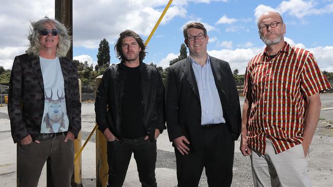 From left, Mona founder David Walsh, Mona creative director Leigh Carmichael, State Growth Minister Matthew Groom and Tasmanian Aboriginal writer Greg Lehmann at Macquarie Point. Picture: LUKE BOWDEN