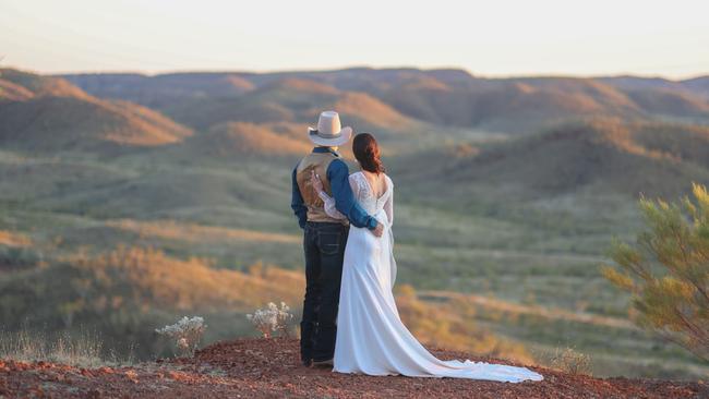 Fred Osman and Kyla Dolen celebrating a rodeo romance for the ages at Mount Isa Mines Rodeo. Picture: Pete Wallis