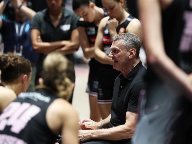 SYDNEY, AUSTRALIA - FEBRUARY 27:  Flames head coach Guy Molloy speaks to players in a time out during game two of the WNBL Semi Final series between Sydney Flames and Bendigo Spirit at Quay Centre, on February 27, 2025, in Sydney, Australia. (Photo by Matt King/Getty Images)