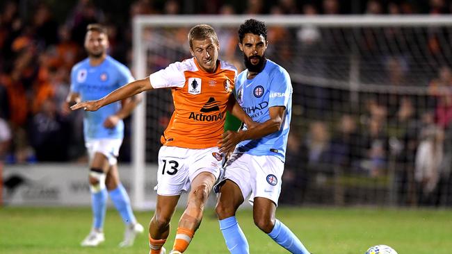 Brisbane Roar midfielder Stefan Mauk battles with then Melbourne City player Osama Malik in an FFA Cup match at Dolphin Stadium last year. (Photo by Bradley Kanaris/Getty Images)