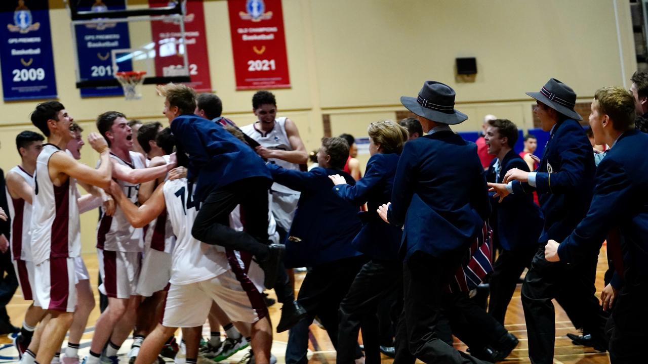 The Southport School First V basketballers met by their schoolmates.. Pic: Heidi Brinsmead.