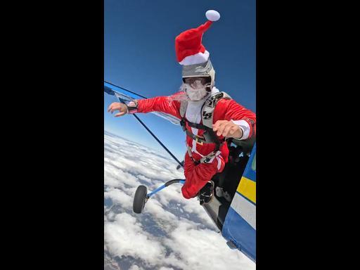 Santa Claus skydives into Geelong region in time for Christmas