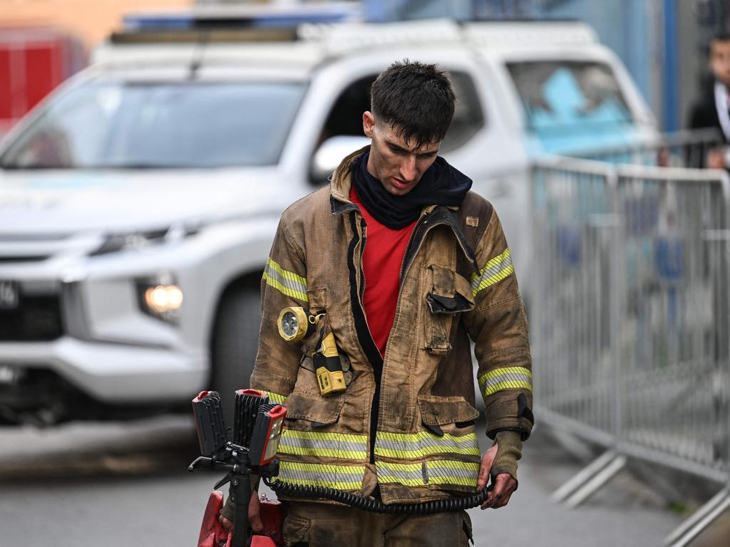 A firefighter intervenes at the site of a fire in a residential building in Istanbul. Picture: AFP