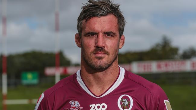 Reds lock Kane Douglas in old style maroon jersey for interstate game. Photo Brendan Hertel, QRU