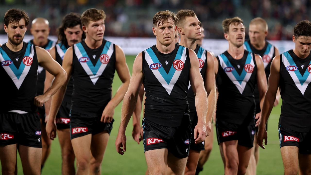 Tom Jonas leads Port Adelaide off after last Thursday’s loss to Melbourne (Photo by James Elsby/AFL Photos via Getty Images)