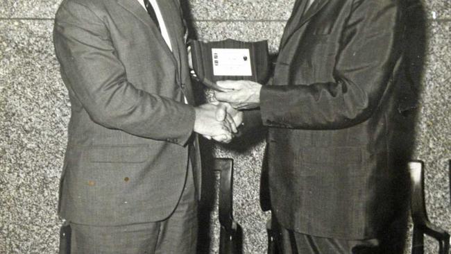 Darrel Palm receives an Australia agricultural award in America in the 1970s