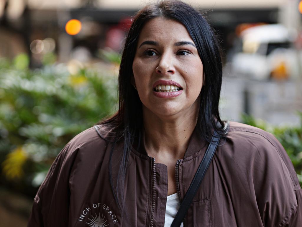 Ms Gowan confronted Young as she left Downing Centre court. Picture: Adam Yip