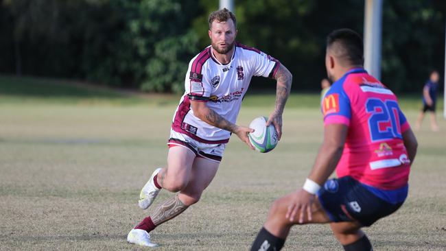 GCDRU (Gold Coast Rugby) first grade clash between Helensvale Hogs (pink) and Nerang Bulls. (white). Jarrod Nyssen. Pic Mike Batterham