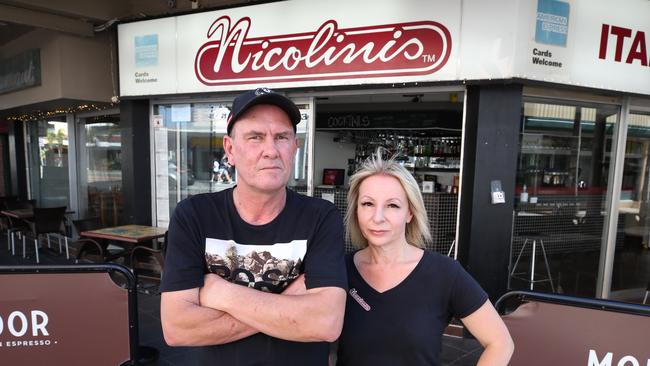 Nicolinis Surfers Paradise owners Murray and Helen Taylor. They are outraged over Schoolies and say the disgraceful behaviour of "spewing drunken pr***s" has resulted in an 80 per cent drop in trade. Picture: Glenn Hampson