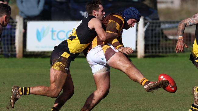 RDFNL: Woodend-Hesket’s Ben Toman gets caught. Picture: Hamish Blair