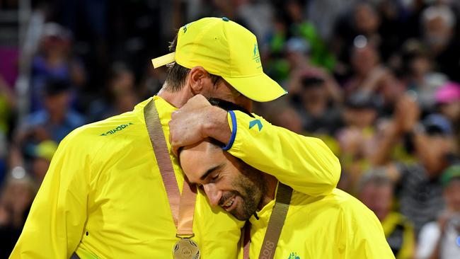 Schumann and McHugh celebrate after receiving their gold.