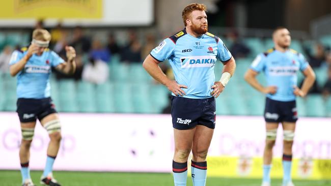 SYDNEY, AUSTRALIA - MAY 14: Harry Johnson-Holmes of the Waratahs looks dejected after a try during the round one Super Rugby Trans-Tasman match between the NSW Waratahs and the Hurricanes at Sydney Cricket Ground on May 14, 2021 in Sydney, Australia. (Photo by Mark Kolbe/Getty Images)