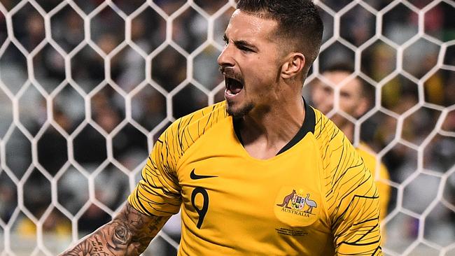 Jamie Maclaren of Australia celebrates after scoring his third goal during the FIFA World Cup Asian Qualifiers match between the Australian Socceroos and Nepal at GIO Stadium in Canberra, Thursday, October 10, 2019. (AAP Image/James Gourley) NO ARCHIVING, EDITORIAL USE ONLY.