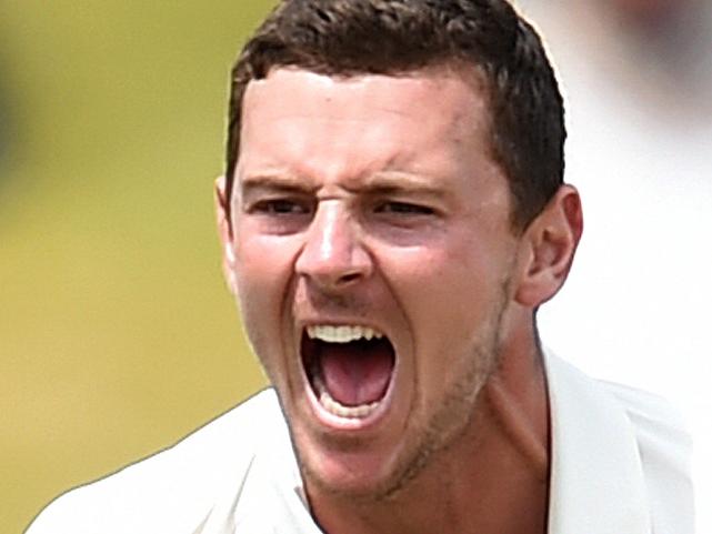 Australian bowler Josh Hazlewood reacts after dismissing New Zealand batsman Doug Bracewell LBW for 23 runs on day 4 of the first Test Match between Australia and New Zealand at the Basin Reserve in Wellington, Monday, Feb. 15, 2016. (AAP Image/Dave Hunt) NO ARCHIVING, EDITORIAL USE ONLY, IMAGES TO BE USED FOR NEWS REPORTING PURPOSES ONLY, NO COMMERCIAL USE WHATSOEVER, NO USE IN BOOKS WITHOUT PRIOR WRITTEN CONSENT FROM AAP