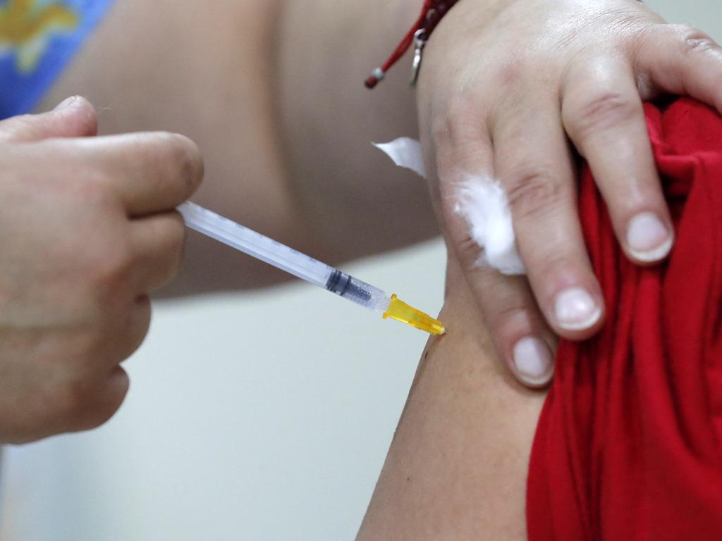 More than 50 per cent of the eligible population who are able to get booster shots have not done so in Queensland. Picture: Javier Torres/AFP