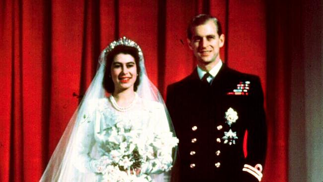 Queen Elizabeth II with Prince Philip at her wedding in 1947.