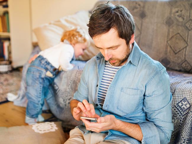 Children of parents who spend more time on their devices than with them will start playing up and feel sad and lonely. Picture: Generic photo