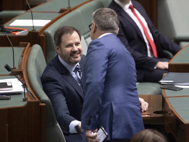 Labor’s new agriculture and resources spokesman Ed Husic speaks with Joel Fitzgibbon during question time. Picture: NCA NewsWire / Gary Ramage