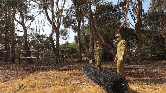 Army Reserves help clear land and build koala enclosures at the Kangaroo Island Wildlife Park in Parndana. Picture: Lisa Maree Williams/Getty 