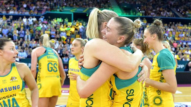 Caitlin Bassett and Courtney Bruce of the Diamonds celebrate Australia’s victory and Bruce’s debut.