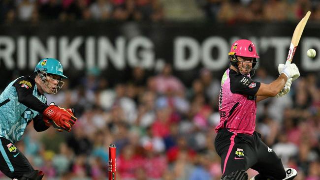 Sydney Sixers' Moises Henriques couldn’t stick around to see his side home. Picture: Izhar Khan / AFP.