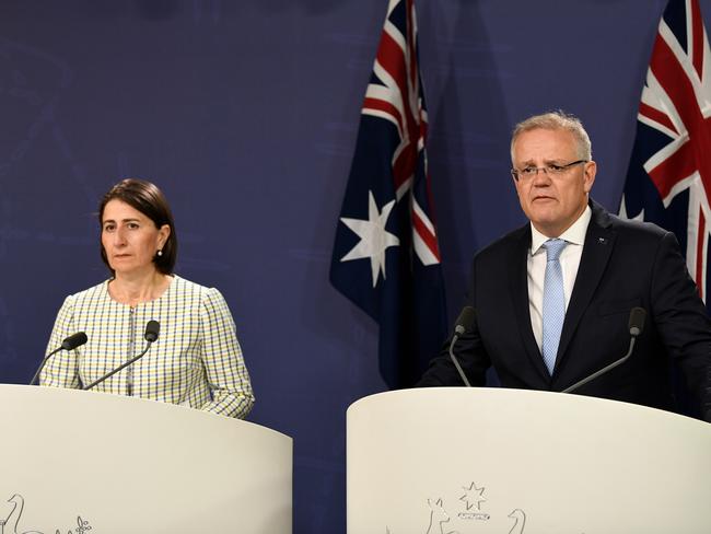 NSW Premier Gladys Berejiklian (left) and Prime Minister Scott Morrison speak to the media during a press conference at the Sydney CPO in Sydney, Friday, January 31, 2020. Prime Minister Scott Morrison and NSW Premier Gladys Berejiklian are set to unveil a new multibillion-dollar fund to open up gas for the domestic market and to fund emissions reduction projects. (AAP Image/Bianca De Marchi) NO ARCHIVING