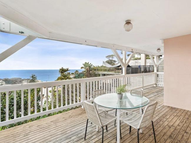 The apartment has a large, full-width, 31sq m northeast facing entertaining deck with valley and ocean views. Picture: realestate.com.au