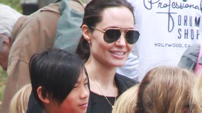 UK CLIENTS MUST CREDIT: AKM-GSI ONLY Angelina Jolie was spotted bringing her kids to the soccer practice in Los Feliz this afternoon. Pictured: Angelina Jolie, Vivienne Jolie-Pitt and Pax Jolie-Pitt Ref: SPL1028290 160515 Picture by: AKM-GSI / Splash News