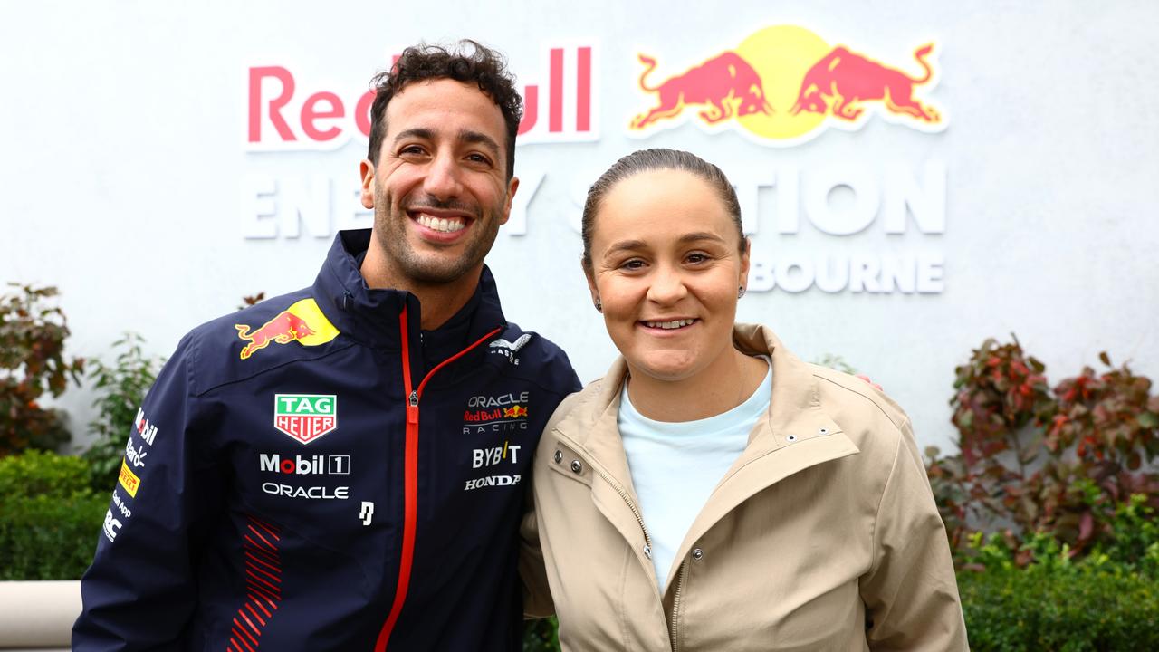 Daniel Ricciardo poses for a photo with Ashleigh Barty at the Aussie Grand Prix Photo by Mark Thompson/Getty Images.