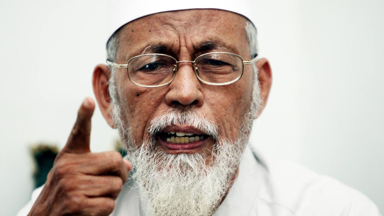 Fanatical Muslim cleric Abu Bakar Bashir talks to the media at the Ngruki Al Mukmin School in Solo, Java, Indonesia.