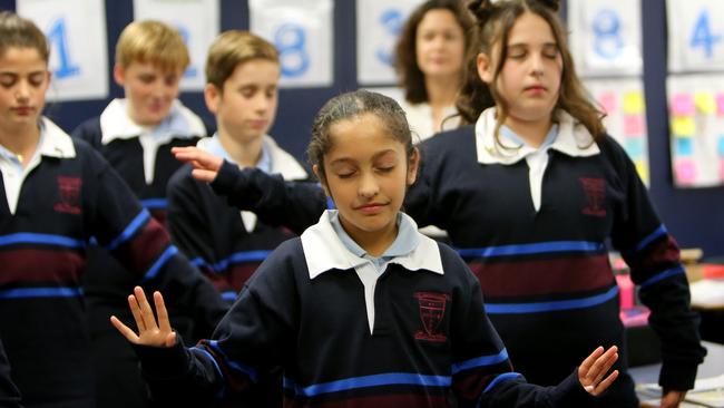 St Joseph’s students take part in a mindfulness exercise. Picture: Stuart McEvoy