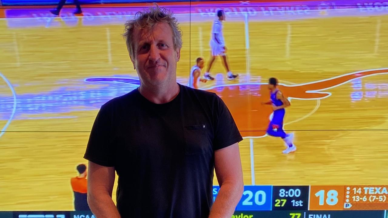 Former Wallaby Bill Young in front of the biggest sports bar TV in Sydney at his Five Dock pub.