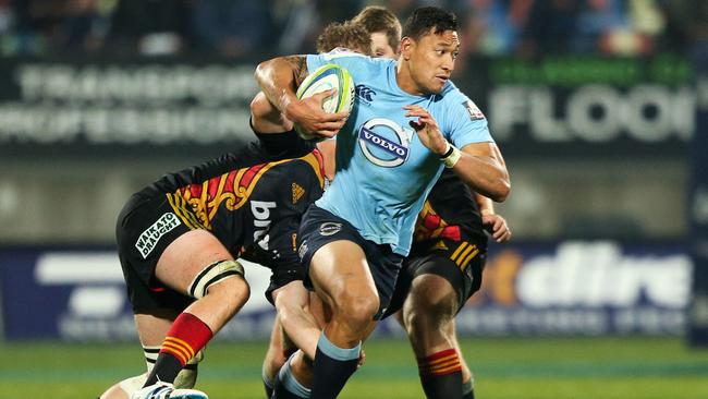 NEW PLYMOUTH, NEW ZEALAND - MAY 31: Israel Folau of the Waratahs makes a break during the round 16 Super Rugby match between the Chiefs and the Waratahs at Yarrow Stadium on May 31, 2014 in New Plymouth, New Zealand. (Photo by Hagen Hopkins/Getty Images)