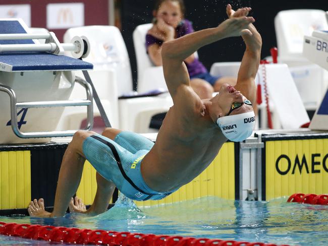 Winner Mitch Larkin pictured during the Mens Open 100m Backstroke at the Swimming Queensland 2017 McDonalds Queensland Championships at the Sleeman Swimming Centre, Brisbane 11th of December 2017.  (AAP Image/Josh Woning)