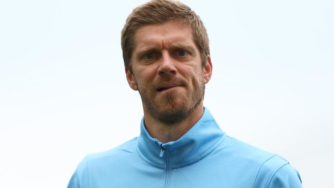 WOLLONGONG, AUSTRALIA - AUGUST 13: Captain of Sydney FC Luke Brattan warms up prior to the round of 32 2023 Australia Cup match between Sydney FC and Central Coast Mariners at WIN Stadium, on August 13, 2023 in Wollongong, Australia. (Photo by Jeremy Ng/Getty Images)