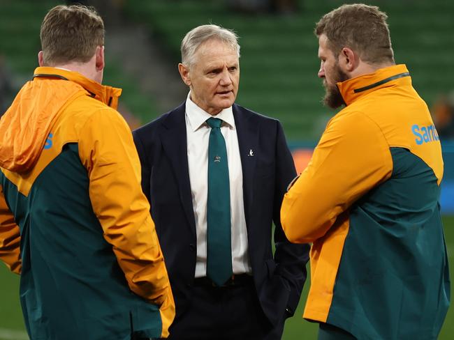 MELBOURNE, AUSTRALIA - JULY 13: Joe Schmidt (C), head coach of the Wallabies talks to James Slipper (R) of the Wallabies after the International Test Match between Australia Wallabies and Wales at AAMI Park on July 13, 2024 in Melbourne, Australia. (Photo by Cameron Spencer/Getty Images)