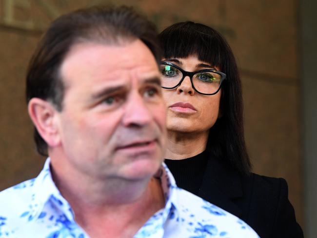 CFMMEU Victorian secretary John Sekta (left) and wife Emma Walters speak to the media outside the Melbourne Magistrates Court in Melbourne, Thursday, June 26, 2019. (AAP Image/Julian Smith) NO ARCHIVING