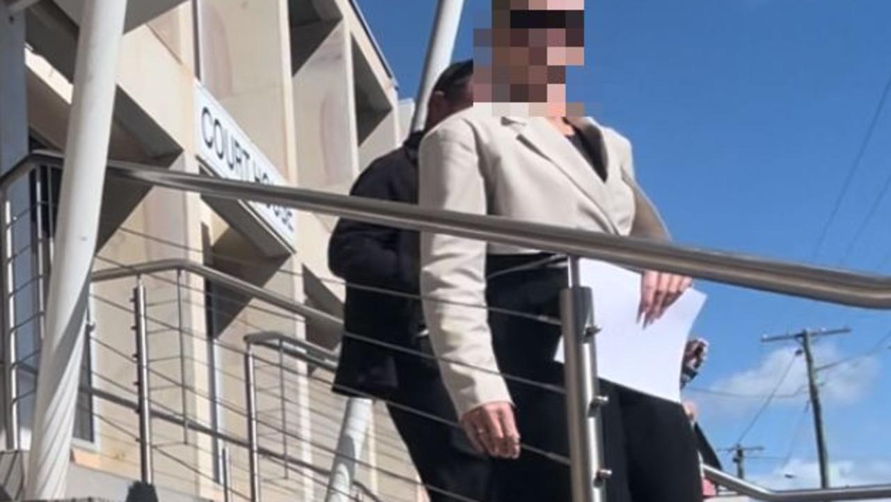 A woman leaves court in Bundaberg after facing charges including three counts of rape and possessing/making child exploitation material.